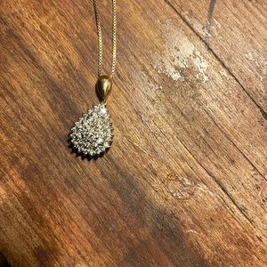 Lovely genuine diamond teardrop necklace set in solid 10k yellow gold